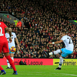 Dimitri Payet scores a free-kick at Liverpool