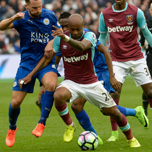 Andre Ayew takes on Danny Drinkwater