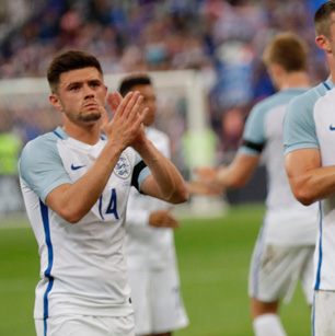 Aaron Cresswell applauds the fans at the end of England's game in France