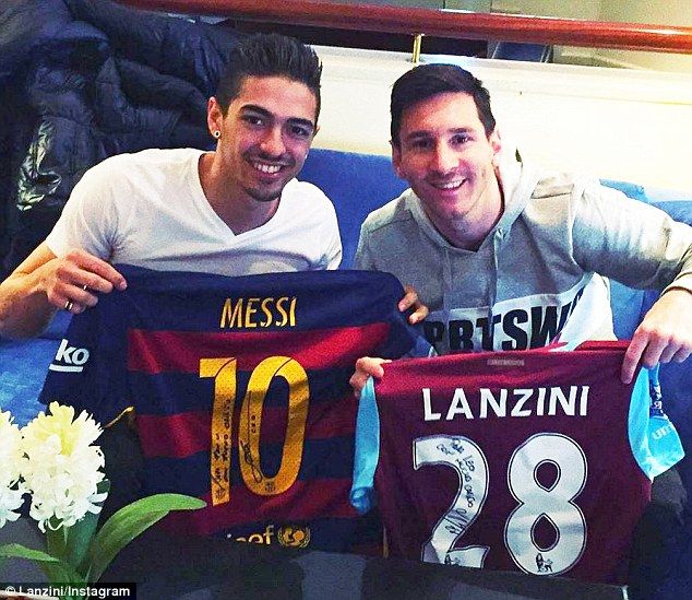 Manuel Lanzini and Lionel Messi