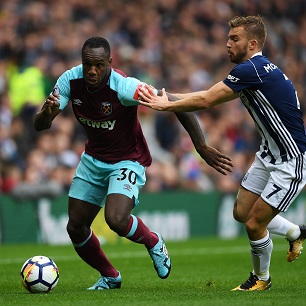 Michail Antonio and James Morrison battle for possession at The Hawthorns