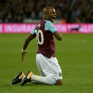 Andre Ayew celebrates scoring against Huddersfield Town