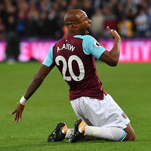 Andre Ayew celebrates scoring against Huddersfield Town