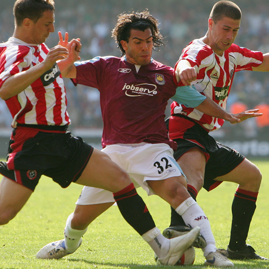 Carlos Tevez in action against Sheffield United