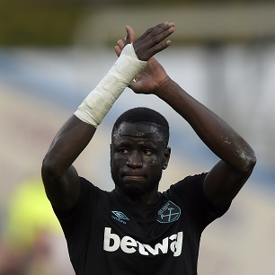 Cheikhou Kouyate applauds the fans at Burnley