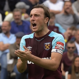 Mark Noble encourages his West Ham United teammates