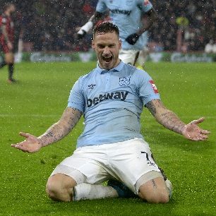 Marko Arnautovic celebrates at the Vitality Stadium