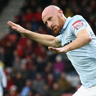 James Collins celebrates scoring at AFC Bournemouth