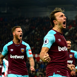 Mark Noble celebrates scoring at Stoke City in December