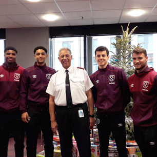 Academy present Christmas donation to Salvation Army