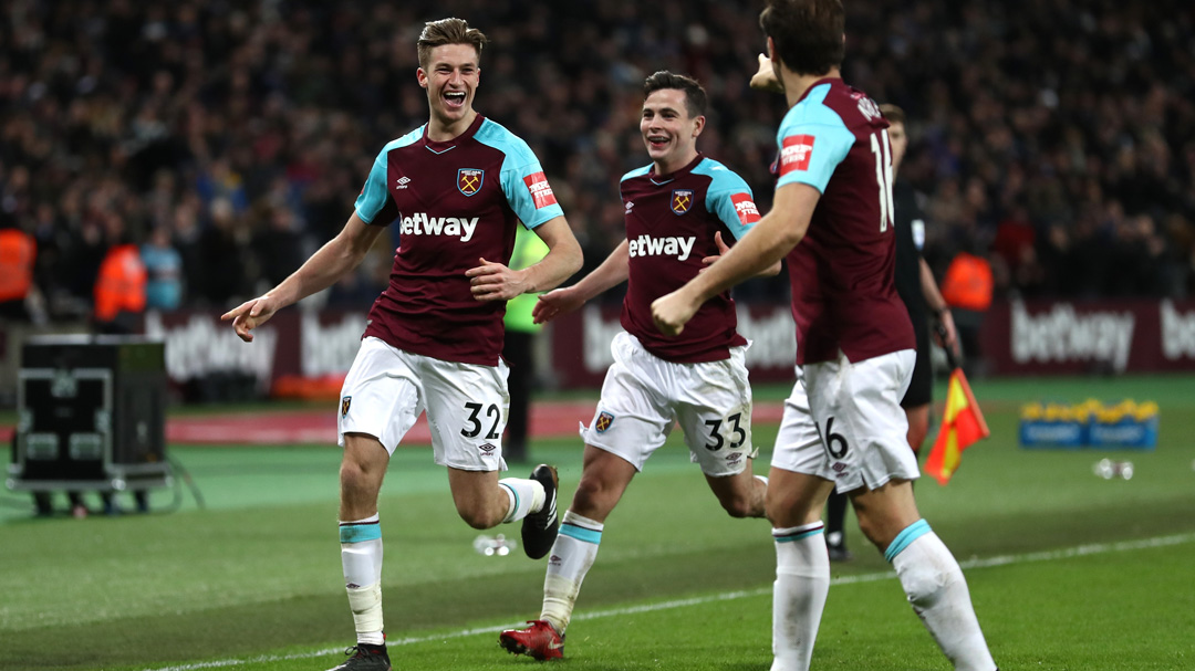 Reece Burke celebrates his goal against Shrewsbury