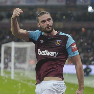 Andy Carroll celebrates scoring against West Bromwich Albion