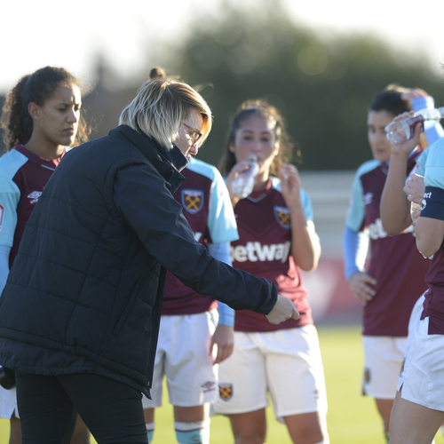 Karen Ray talks with her West Ham Ladies players during the draw with Gillingham