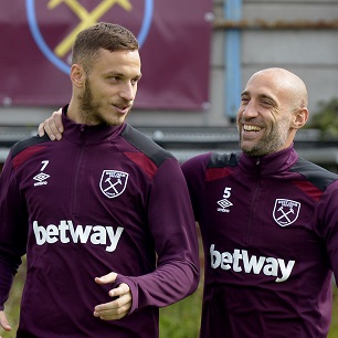 Marko Arnautovic and Pablo Zabaleta enjoy a laugh at Rush Green