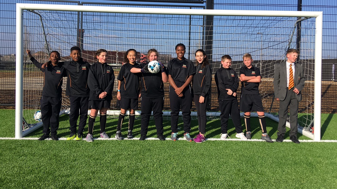 Youngsters from Bobby Moore Academy paid tribute to the late West Ham United captain