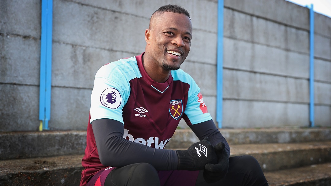 Patrice Evra was all smiles at Rush Green on Wednesday