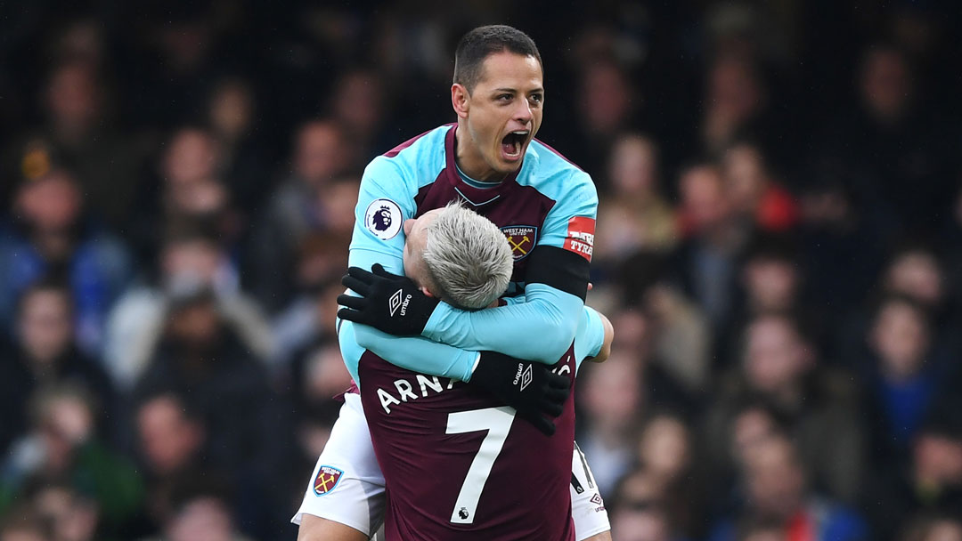 Chicharito and Marko Arnautovic celebrate the Mexican's equaliser at Chelsea