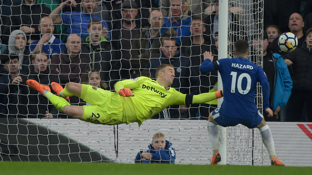 Joe Hart flies to his left to push Olivier Giroud's header onto the post