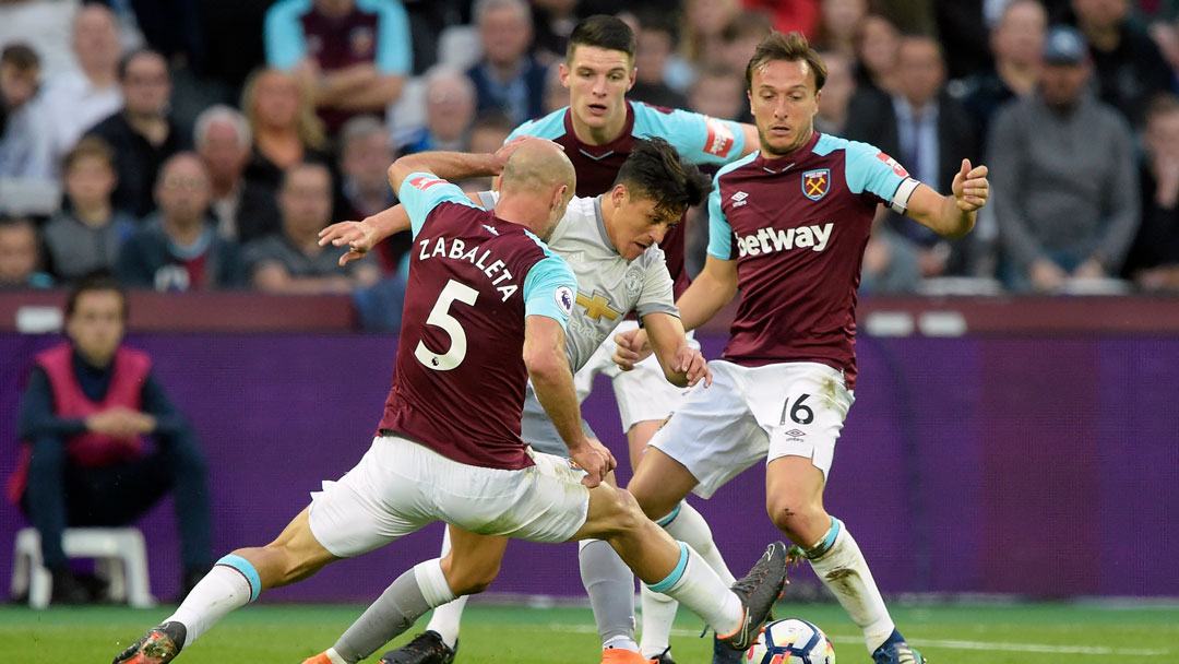 Pablo Zabaleta, Declan Rice and Mark Noble keep tabs on Alexis Sanchez