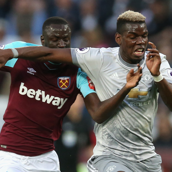 Cheikhou Kouyate battles with Paul Pogba