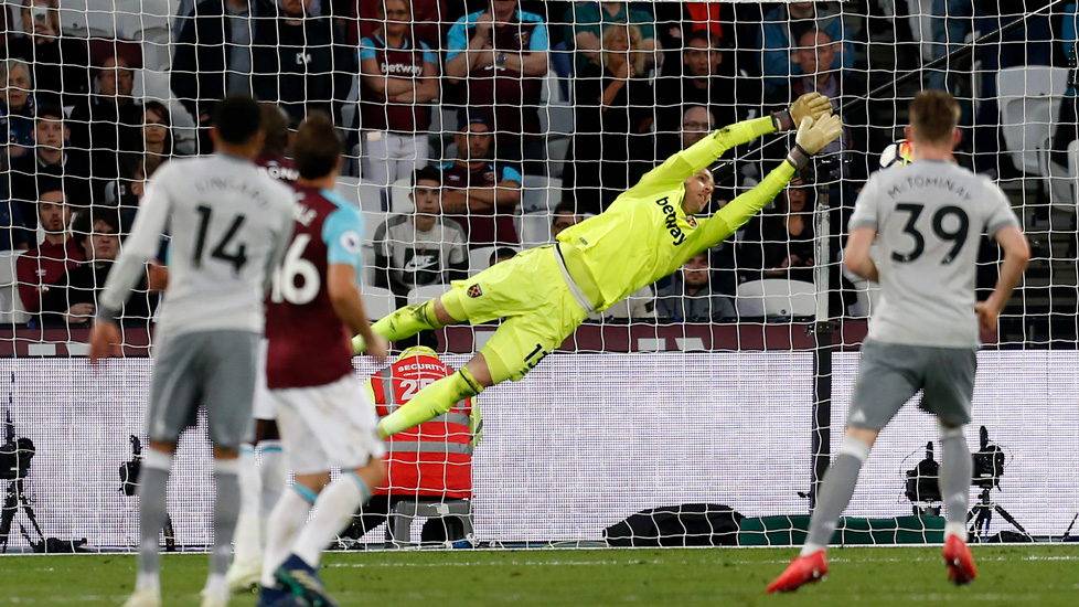 Adrian makes a save from Jesse Lingard