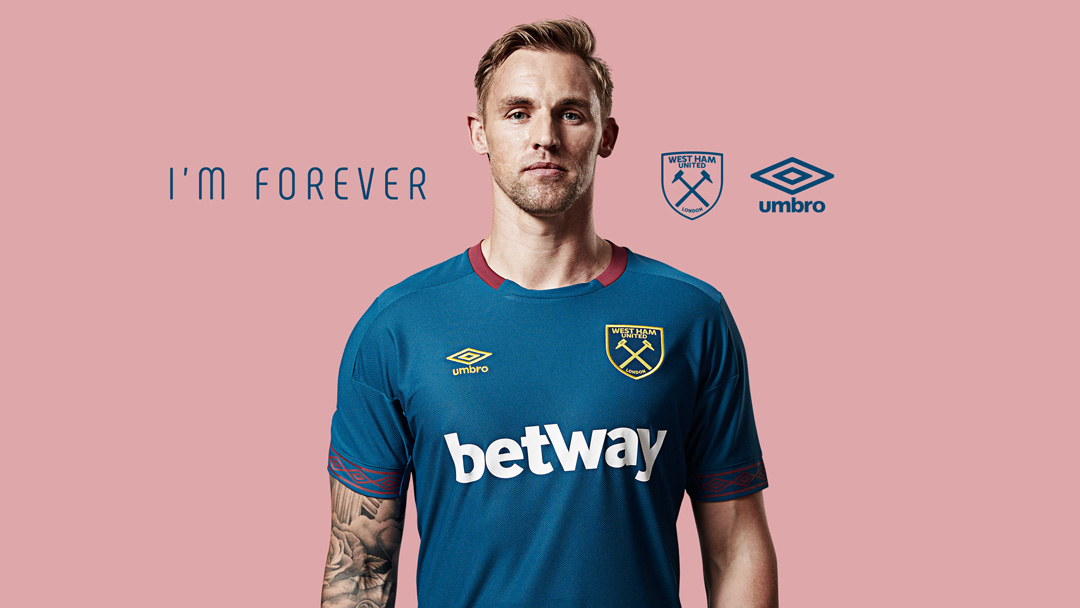 Jack Collison models the 2018/19 Away kit