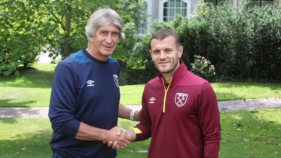 Manuel Pellegrini shakes hands with Jack Wilshere