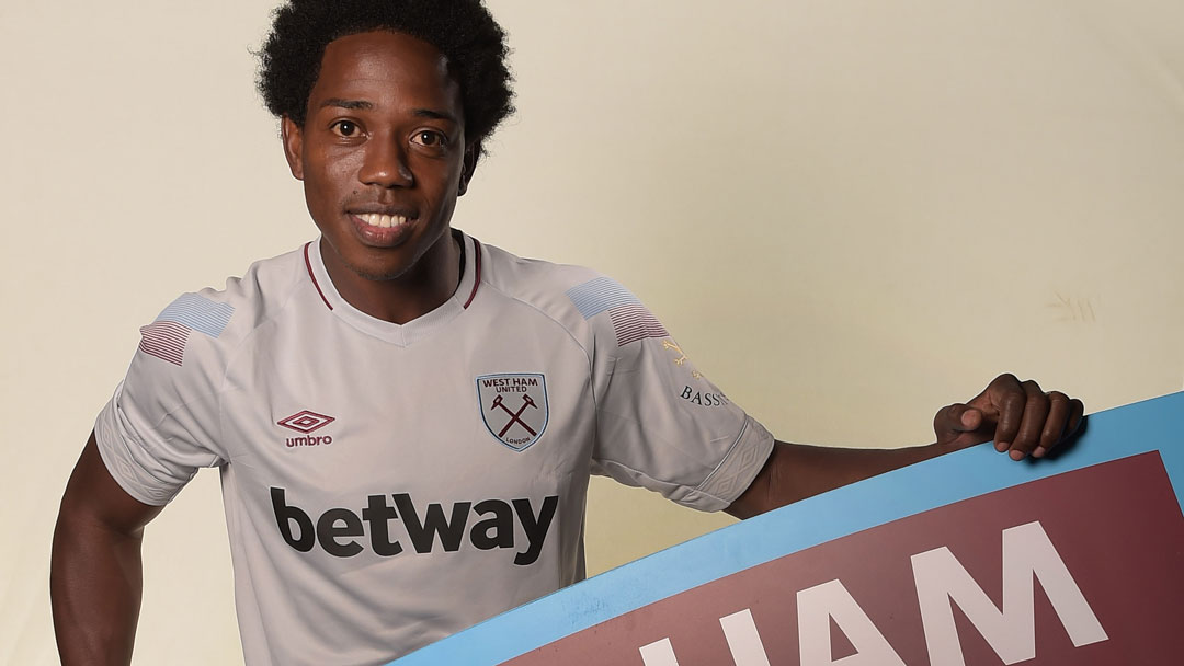 Carlos Sanchez with the West Ham United crest