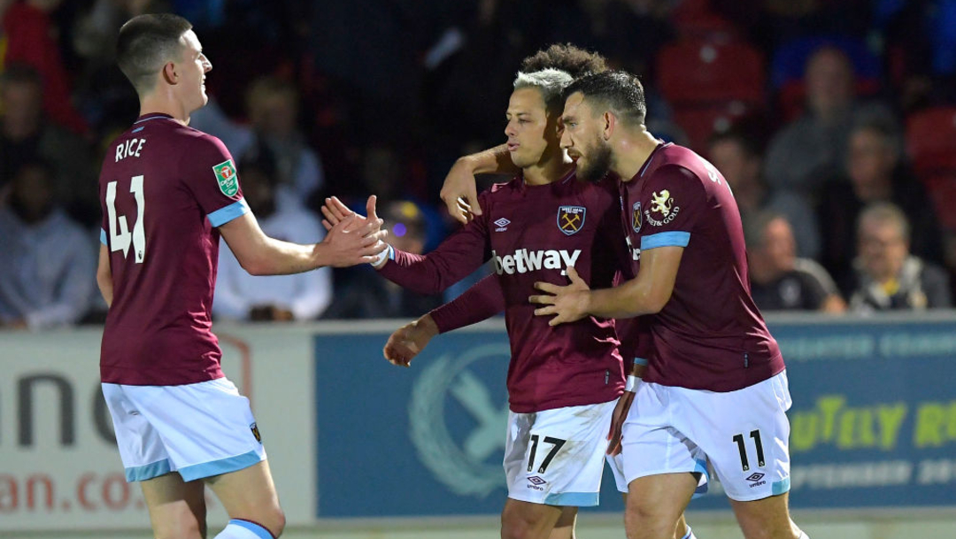 Chicharito celebrates his goal v AFC Wimbledon with Robert Snodgrass and Declan Rice