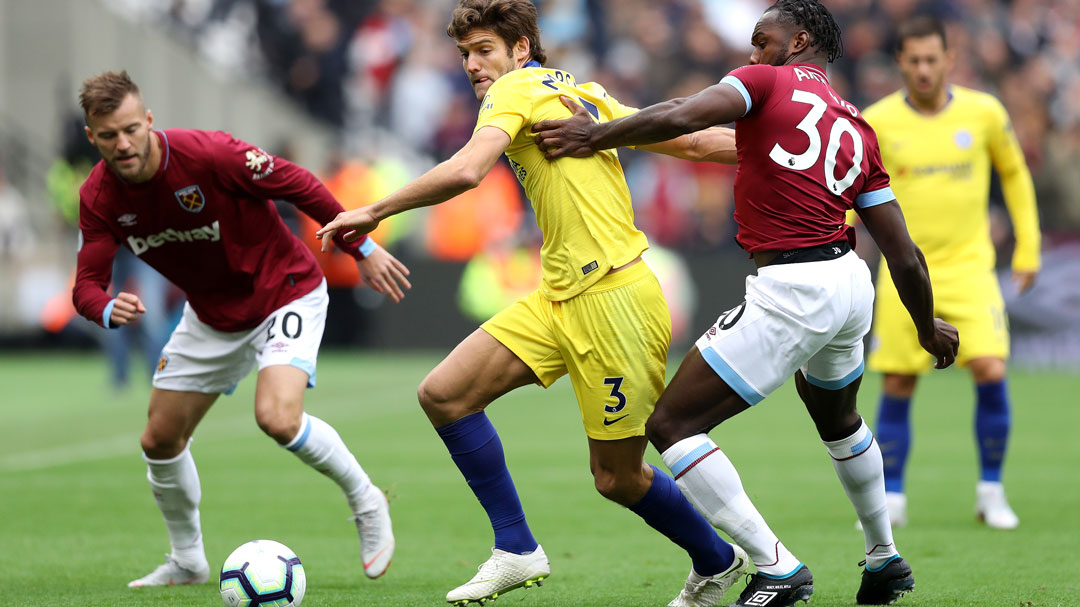 Michail Antonio keeps tabs on Chelsea's Marcos Alonso