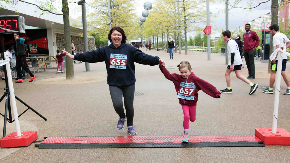 Runners cross the finish line