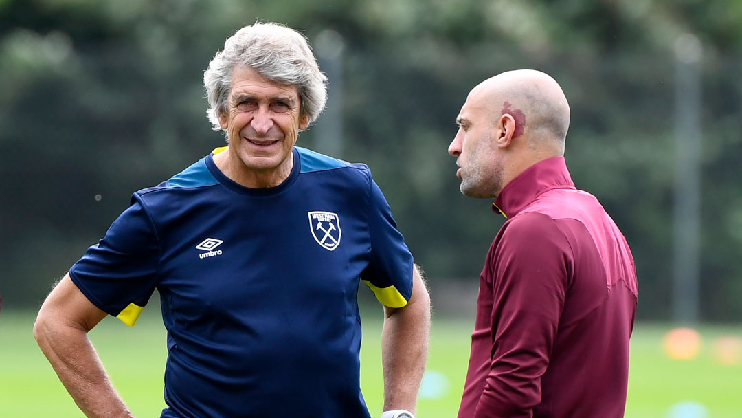 Manuel Pellegrini and Pablo Zabaleta talk at Rush Green