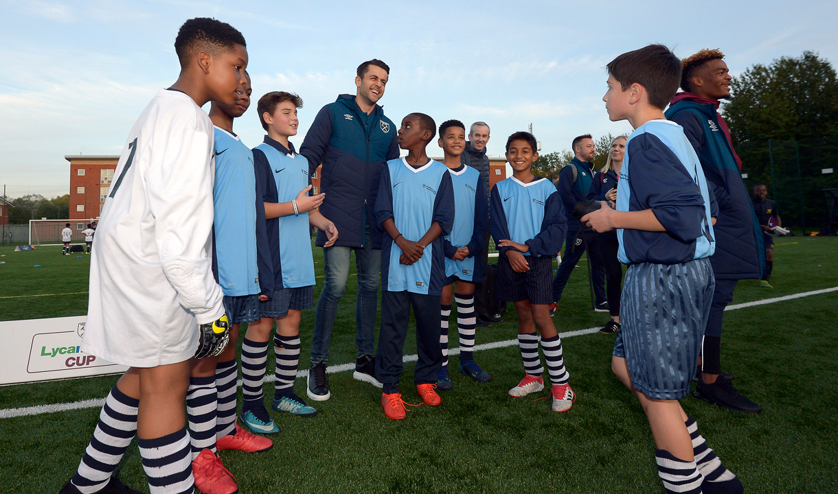 Lukasz Fabianski with players at the Lycamobile Cup