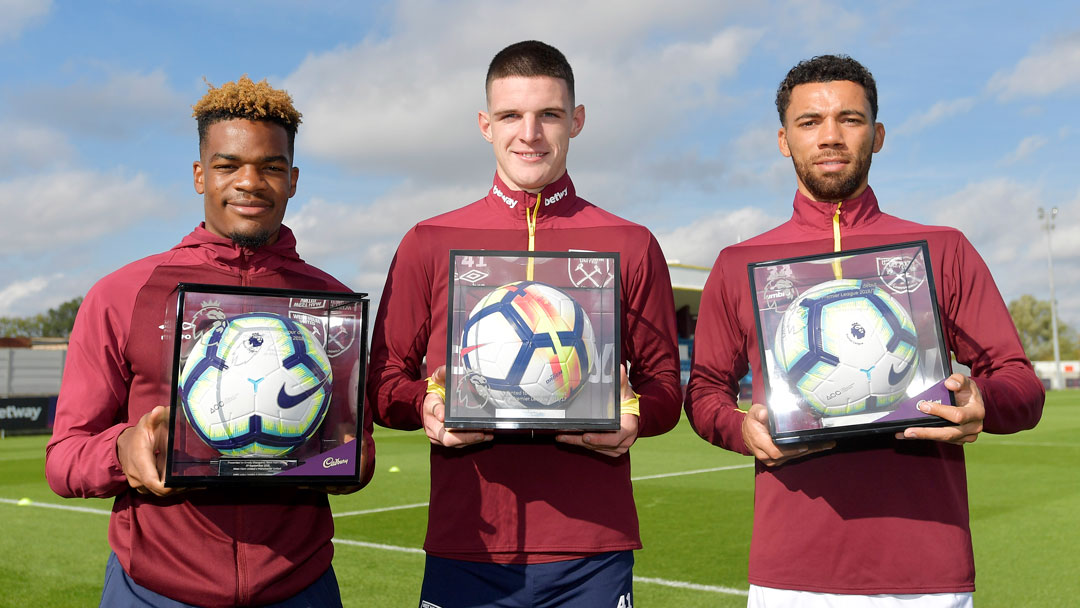 Grady Diangana, Declan Rice and Ryan Fredericks with their Premier League Debut Footballs