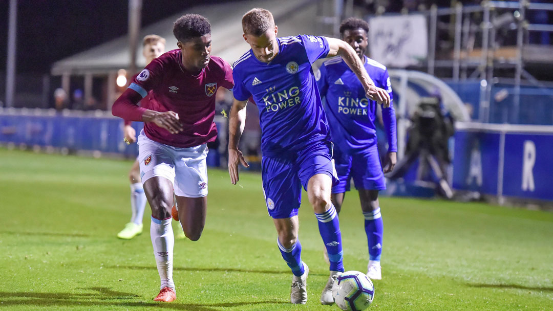 Ben Johnson battles for possession with Andy King