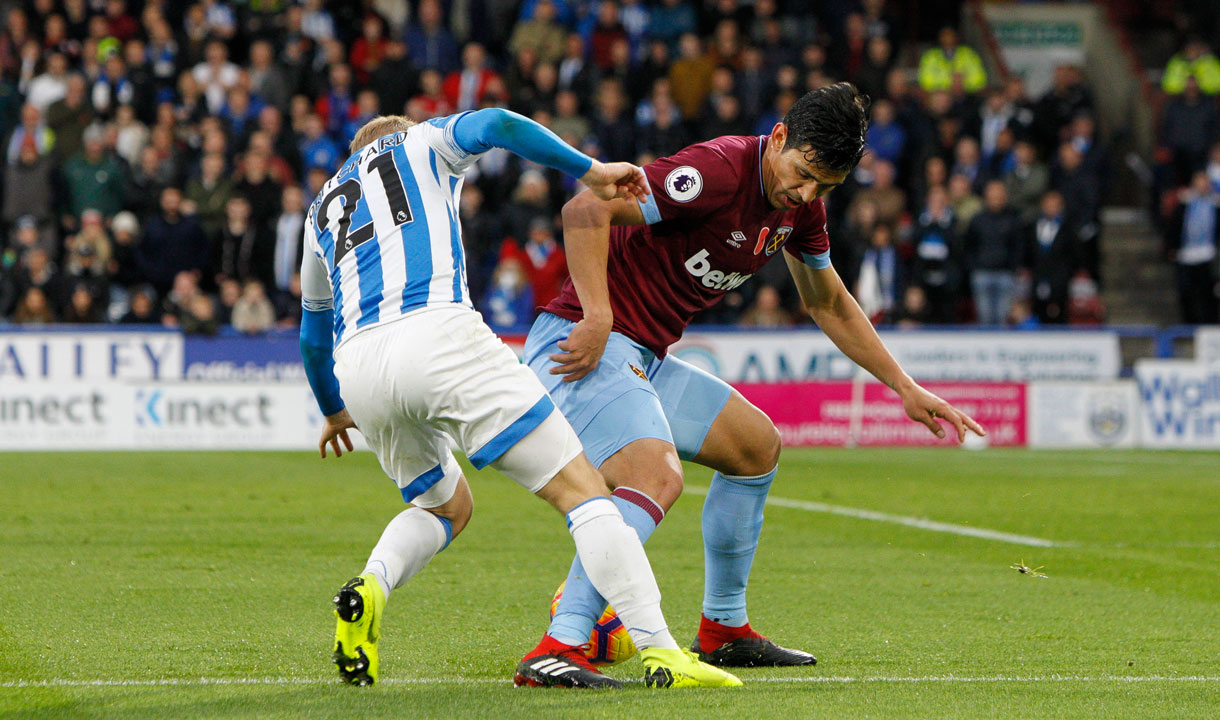 Fabian Balbuena challenges Alex Pritchard