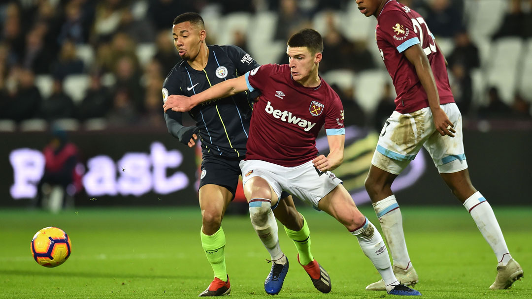 Declan Rice battles for possession with Gabriel Jesus