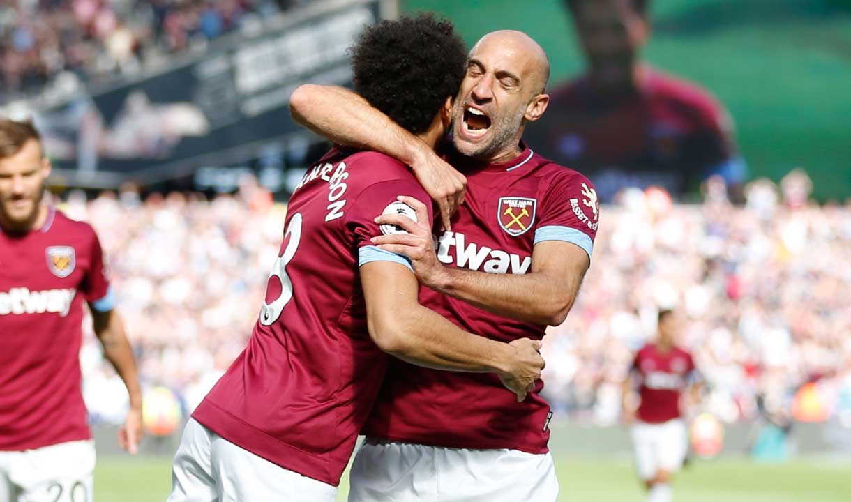 Pablo Zabaleta celebrates with Felipe Anderson