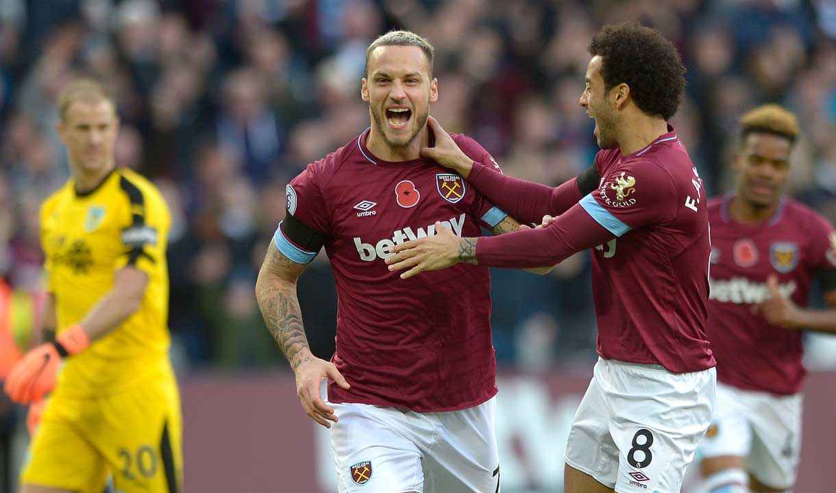 Marko Arnautovic celebrates scoring against Burnley