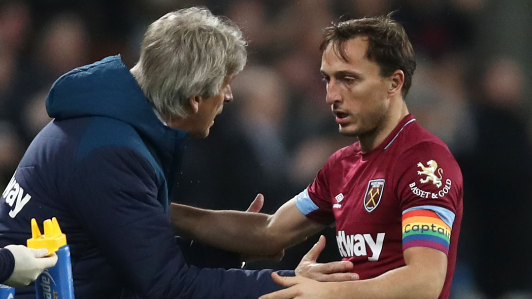 Manuel Pellegrini with Mark Noble