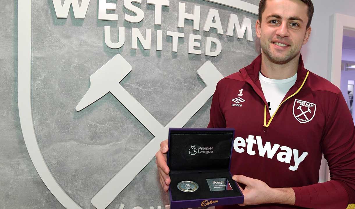 Lukasz Fabianski with his award for reaching 200 Premier League appearances