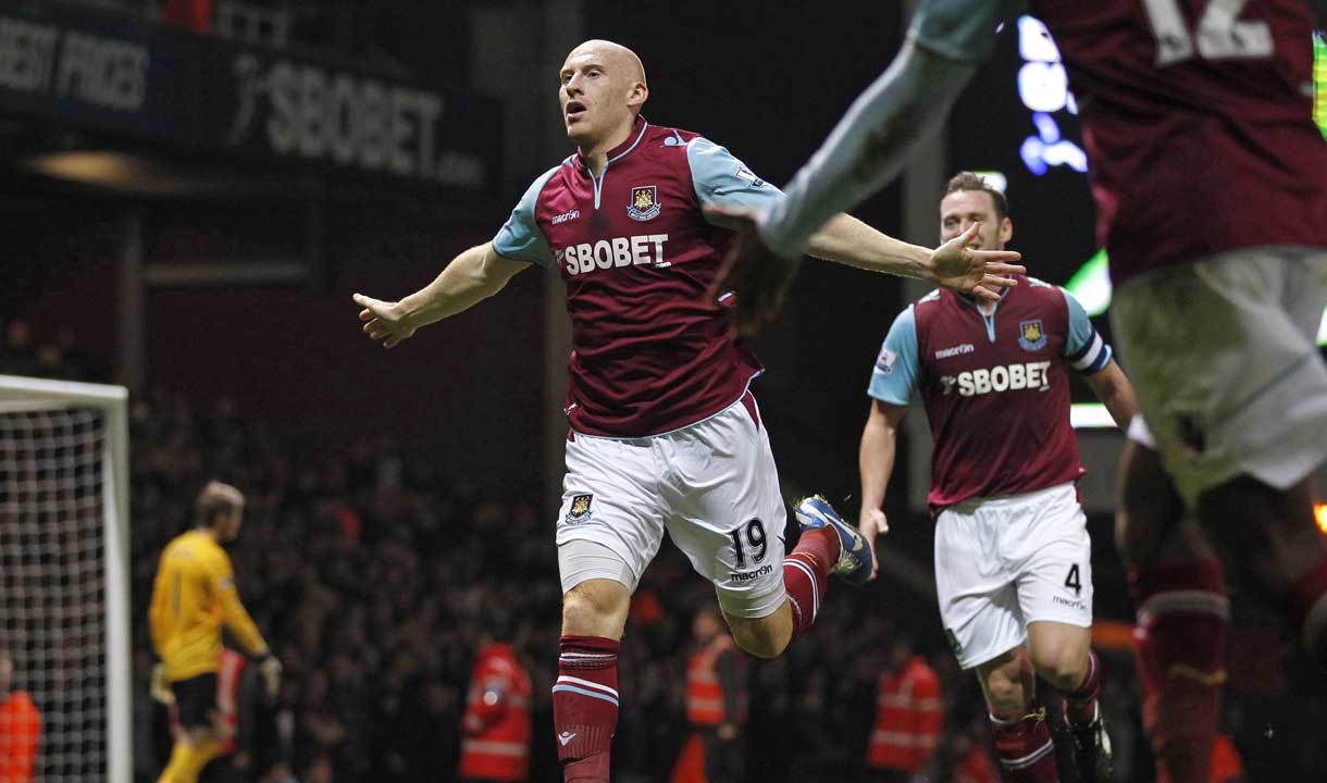 James Collins celebrates his goal against Manchester United