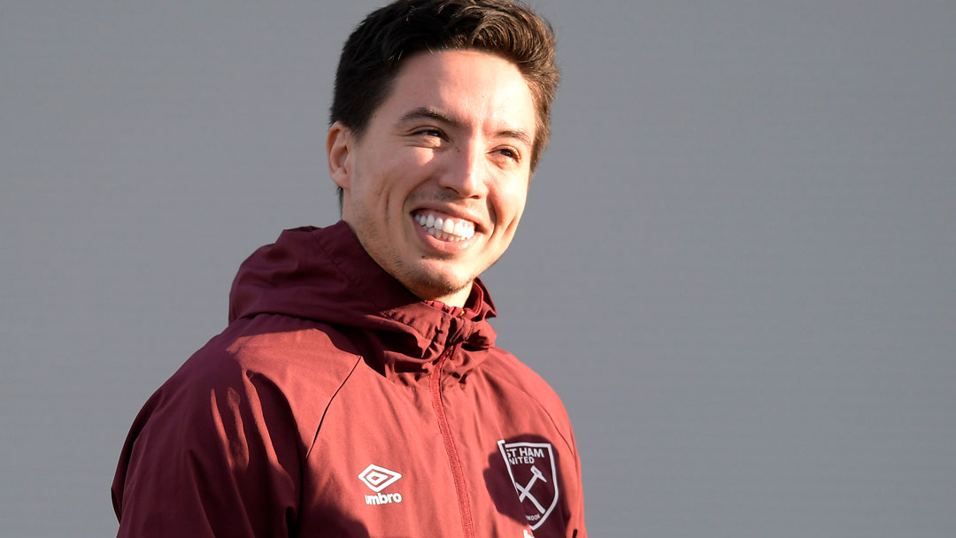 Samir Nasri smiles in training