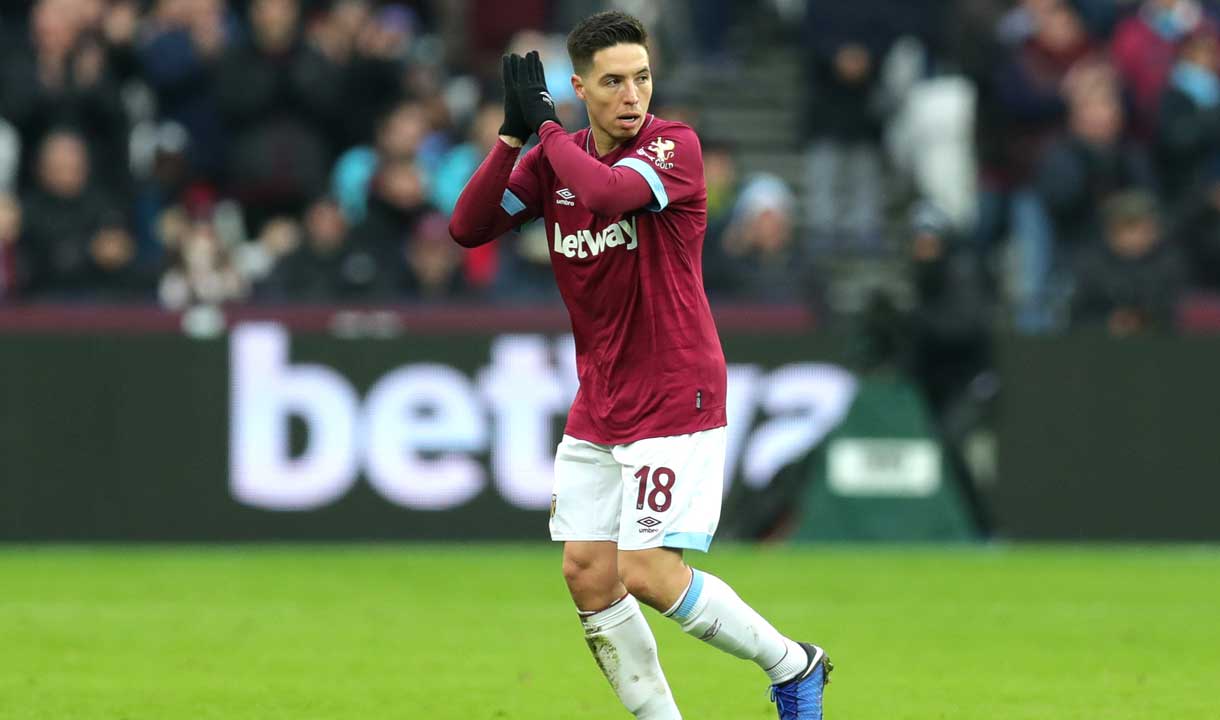 Samir Nasri applauds the fans against Birmingham