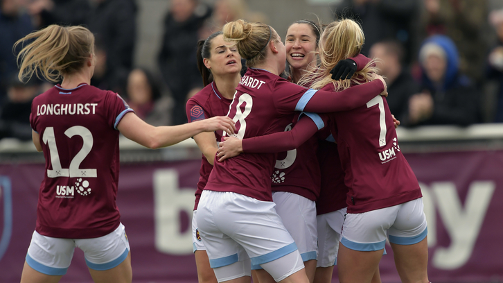 Ross celebrates with her teammates