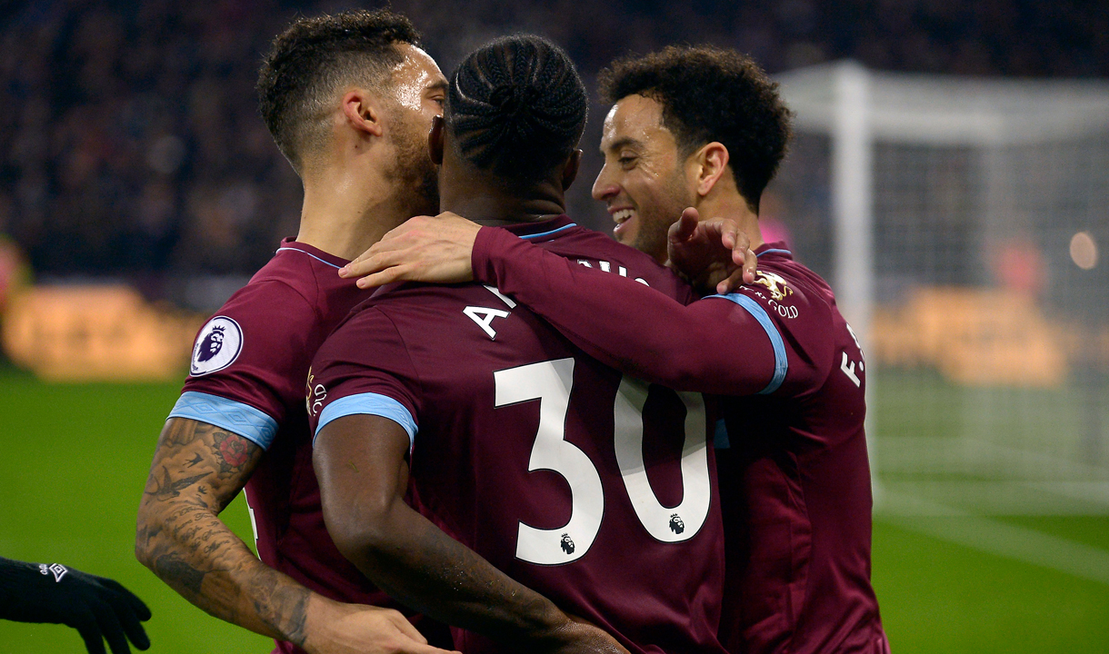 Felipe Anderson celebrates with Michail Antonio and Ryan Fredericks