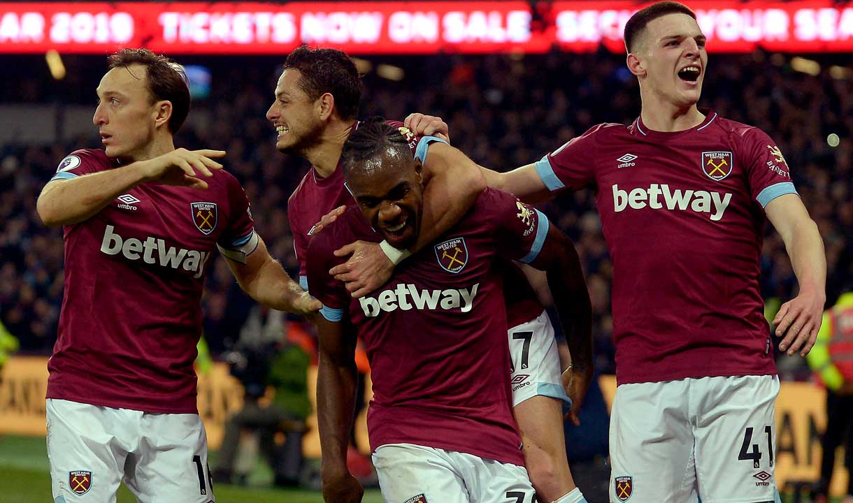 Michail Antonio celebrates scoring against Liverpool