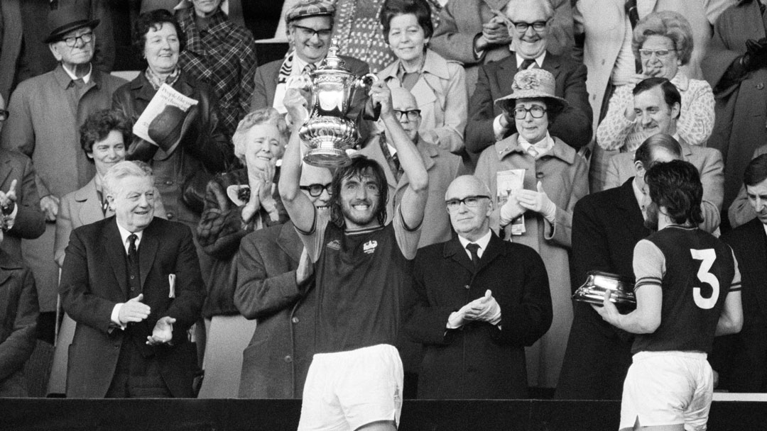 Billy Bonds lifts the FA Cup in 1975