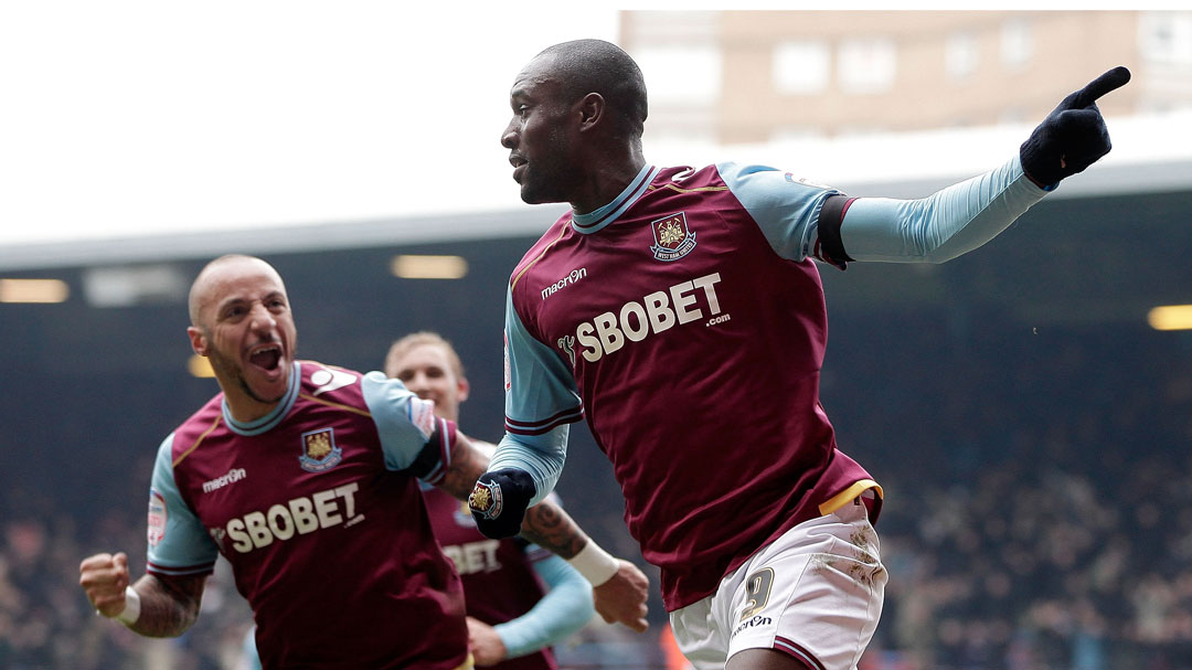 Carlton Cole celebrates scoring against Millwall in February 2012