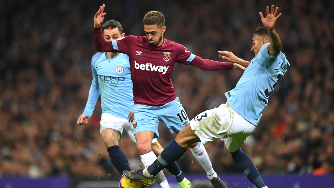 Manuel Lanzini takes on the Manchester City defence on Wednesday night